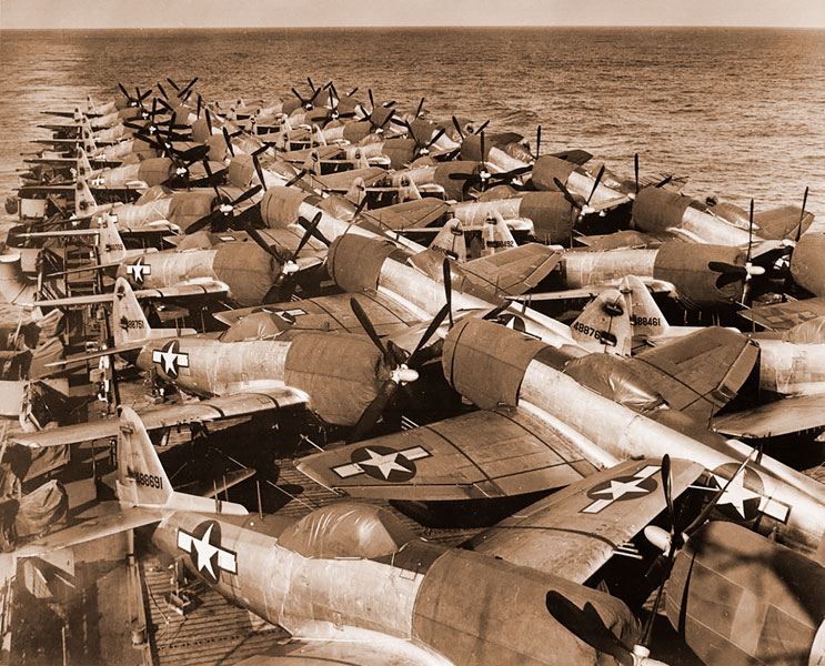 Image: D.C. Diers/US Navy##A deckload of U.S. Army Air Force Republic P-47N Thunderbolt fighters on the flight deck of USS Casablanca in July 1945. The planes were loaded at Naval Air Station Alameda and were bound for Guam.