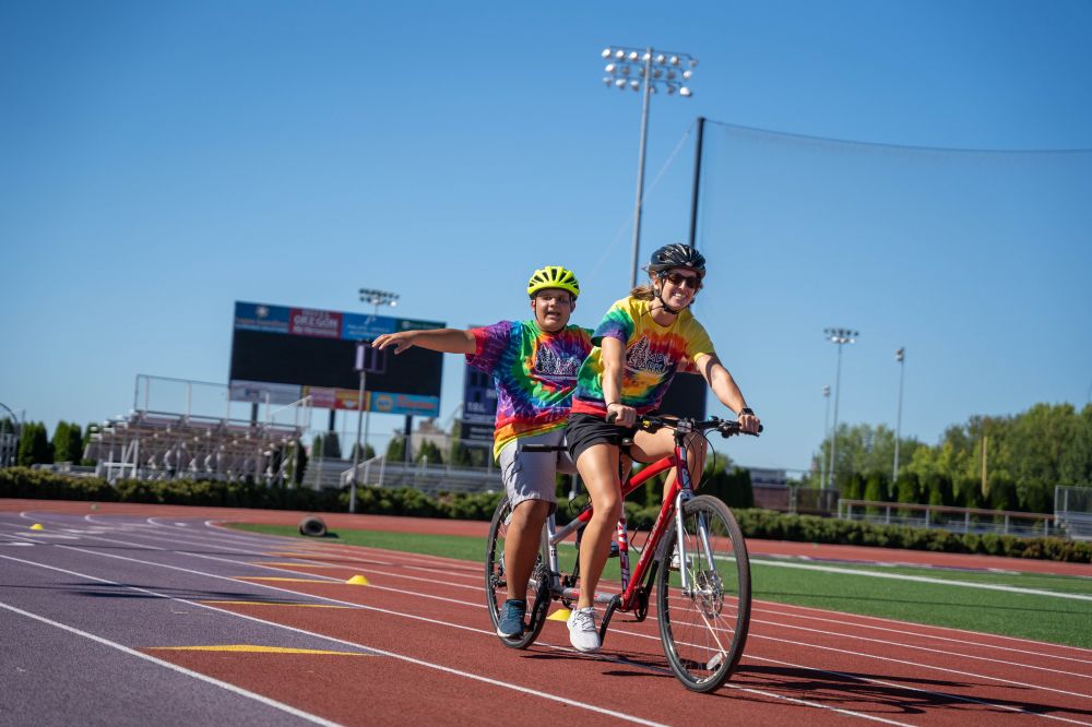 Courtesy NWABA##Athlete and supporter participate in tandem cycling at Linfield University.