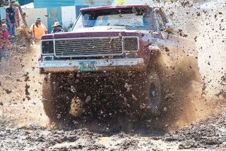 Rusty Rae/News-Register##
Charles Quinton blasts through the Willamina mud bog in 3.52 seconds to take the super modified class. He was only the fifth driver to complete the entire course. He also won the super modified class in the mud drag event. Rusty Rae/News-Register##
Charles Quinton blasts through the Willamina mud bog in 3.52 seconds to take the super modified class. He was only the fifth driver to complete the entire course. He also won the super modified class in the mud drag event.