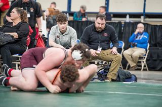 Marcus Larson/News-Register file photo##
Dayton head wrestling coach Rob Henry (right) and his son, Jared, watch the Pirates compete at the 2019 OSAA State Wrestling Championships. Marcus Larson/News-Register file photo##
Dayton head wrestling coach Rob Henry (right) and his son, Jared, watch the Pirates compete at the 2019 OSAA State Wrestling Championships.