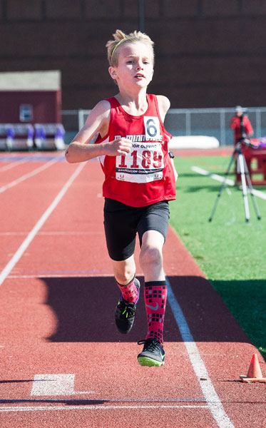 Marcus Larson/News-Register##
Hunter Hurl finishes a personal best in the 1,500 meter run at the West Coast Invitational track meet held at Linfield July 14. This week he is in Kansas, competing against the best in his age group.