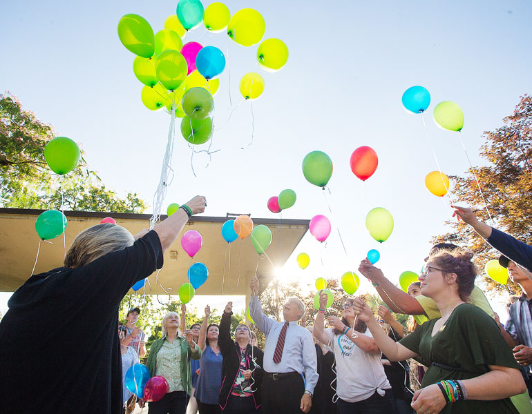 Rockne Roll/News-Register##Participants release balloons into the evening sky at a gathering last Thursday at the Yamhill County Courthouse to remember the victims of the May 2016 street racing crash on Highway 99W north of McMinnville.