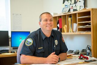 Rusty Rae/News-Register ##
Scott Law, in his office at the Amity Fire Station, says he’s “very, very happy” to have the chance to serve the district in a professional capacity.