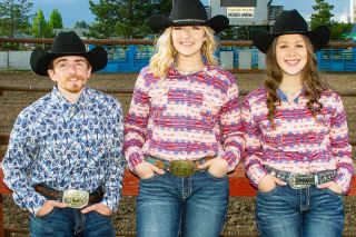 Submitted photo ##
Christopher Trapp, Emily Hembree and Izzy Tillotson pose at the rodeo arena. They’re serving as this year’s Yamhill County Fair ambassadors, tasked with promoting the event throughout the community. All three are seasoned fair participants. Submitted photo ##
Christopher Trapp, Emily Hembree and Izzy Tillotson pose at the rodeo arena. They’re serving as this year’s Yamhill County Fair ambassadors, tasked with promoting the event throughout the community. All three are seasoned fair participants.
