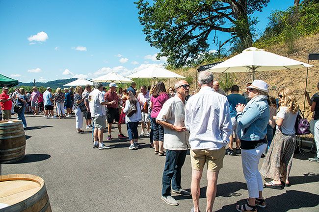 Rusty Rae/News-Register ## 
Participants in the Yamhill Carlton AVA summer tasting at Resonance Winery found sunny weather along with samples from 35 wineries and snacks from several eateries.