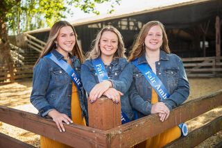 Rusty Rae/News-Register##
Yamhill County Fair & Rodeo ambassadors Kaydence Vertner, Cheyanna Kelly and Madison Bingman will be greeting people at the fair Wednesday through Saturday. They say they want to help visitors learn about the importance of agriculture in our lives.