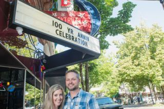 News-Register file photo##
Owners Justin and Amanda Dillingham stand in front of the Blue Moon, named business of the year at the McMinnville Downtown Association awards banquet Thursday.