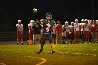 Rusty Rae/News-Register file photo##
Yamhill-Carlton senior quarterback Jaime Garcia aims to lead the Tigers to a second straight playoff qualification this season. The track and field star remains a dangerous dual-threat when leading Y-C’s spread offense. Rusty Rae/News-Register file photo##
Yamhill-Carlton senior quarterback Jaime Garcia aims to lead the Tigers to a second straight playoff qualification this season. The track and field star remains a dangerous dual-threat when leading Y-C’s spread offense.