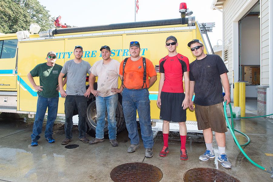 Marcus Larson / News-Register##From left, Jeremy Plummer, Jeff Nichols, Cody Coonrod, Blake Paulson, Justin Bobbett and Tanner Morton were part of a local task force of firefighters who returned Tuesday from combating the Cornet-Windy Ridge Complex fire in Eastern Oregon.