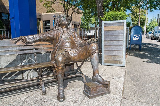 Marcus Larson/News-Register##If he cold get up from his bronze bench, Ben Franklin would only need to walk a few steps to mail a letter or a ballot.