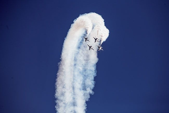 Rusty Rae/News-Register
##
The U.S. Air Force Thunderbirds do an over-the-top maneuver, thrilling the crowd at the Oregon International Air Show Saturday. The team headlined a show that also included F-35s, World War II planes and aerobatic performances.