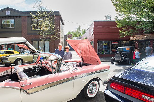 Rusty Rae/News-Register
##Victoria Linton’s 1957 Ford, painted in a stock two-tone coral, drew interest from people who either remembered the car from their youths or were intrigued by seeing it for the first time.