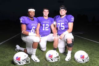 Rusty Rae/News-Register##
Linfield’s Big Three, who hope to lead the Wildcats to another conference title are (l-r) Chidibem Nnoli (6) at running back, Wyatt Smith (12), returning quarterback and McMinnville High alum, and pre-season All-American left tackle Dakota Smith (75). Rusty Rae/News-Register##
Linfield’s Big Three, who hope to lead the Wildcats to another conference title are (l-r) Chidibem Nnoli (6) at running back, Wyatt Smith (12), returning quarterback and McMinnville High alum, and pre-season All-American left tackle Dakota Smith (75).