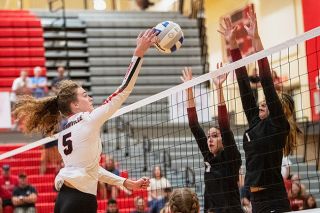Rusty Rae/News-Register##Maddie Gerhart strikes for one of her team-leading eight killls in the Grizzlies season opener against Southridge on Tueday night. Rusty Rae/News-Register##Maddie Gerhart strikes for one of her team-leading eight killls in the Grizzlies season opener against Southridge on Tueday night.