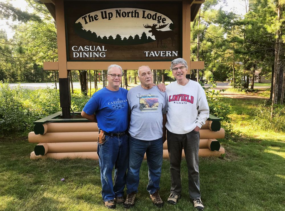 ##Wayne Young, center, and his son, Larry, both Upper Peninsula residents, with News-Register Managing Editor Kirby Neumann-Rea, at a local restaurant.