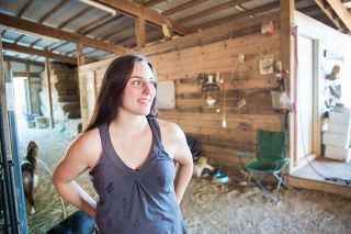 Rusty Rae/News-Register ##
Alexis Wilkinson, mustang horse trainer and riding instructor,  pauses during a teaching session at the barn where she trains west of Yamhill. Wilkinson gentled her first wild yearling at age 13, through the Teens & Mustangs program.