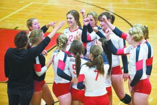 Marcus Larson/News-Register##The McMinnville volleyball team celebrates during its 25-15, 25-16, 25-12 victory over North Salem Tuesday evening at The Furnace. Marcus Larson/News-Register##The McMinnville volleyball team celebrates during its 25-15, 25-16, 25-12 victory over North Salem Tuesday evening at The Furnace.