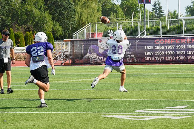 Rusty Rae/The News-Register##
Joel Valdez, the 2021 Northwest Conference Freshman of the Year, beats the Linfield secondary for a 50-yard gain during a practice scrimmage.