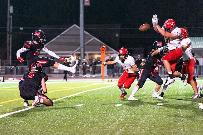 Marcus Larson/News-Register## McMinnville place kicker Bryan Blank nails the game-winning 21-yard field goal to lift the Grizzlies to a 23-21 victory over the Oregon City Pioneers.