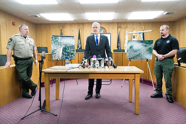 Marcus Larson/News-Register
Yamhill County District Attorney Brad Berry gives a press conference on the investigation into Meighan Cordie s death with Sheriff Tim Svenson, left, and Sheriff’s Office detective Will Lavish, right.