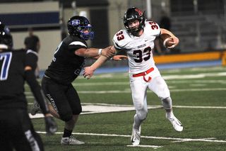Rusty Rae/News-Register file photo##
McMinnville tail back Noah Kepler, pictured against South Medford last week, is aiming for increased production in the running game Friday at home against Centennial. Rusty Rae/News-Register file photo##
McMinnville tail back Noah Kepler, pictured against South Medford last week, is aiming for increased production in the running game Friday at home against Centennial.