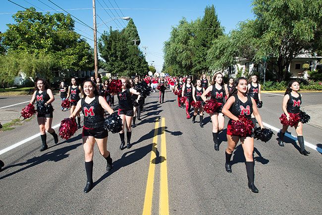 Marcus Larson/News-Register##
The McMinnville High School Dance Team leads they way as the homecoming parade makes its way down Evans Street.