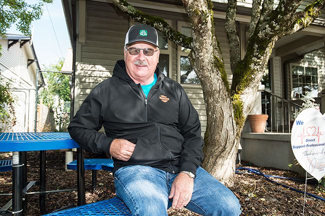 Marcus Larson/News-Register ## Harold Washington sits near the MV Advancements building. The nonprofit is one of the organizations he’s helped over many years of quietly contributing to the community.