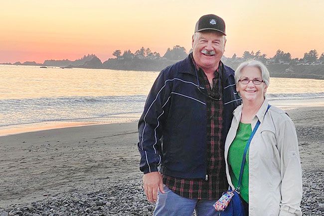 Submitted photo ##
Harold and Christine Washington walk on the beach in Brookings during Labor Day weekend 2020. He calls her his “girlfriend,” although they’ve been married 42 years and together since junior high school.