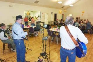 Starla Pointer/New-Register##Johnny’s Country Western Band play a tune during the celebration marking the 50th anniversary of the Friends of the McMinnville Senior Center.