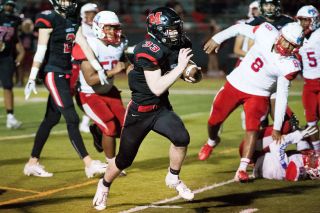 Marcus Larson/News-Register##
McMinnville s Noah Kepler (33) races toward the end zone, scoring a 17-yard touchdown to seal the Grizzlies 41-27 win over Centennial on homecoming night. Marcus Larson/News-Register##
McMinnville s Noah Kepler (33) races toward the end zone, scoring a 17-yard touchdown to seal the Grizzlies 41-27 win over Centennial on homecoming night.