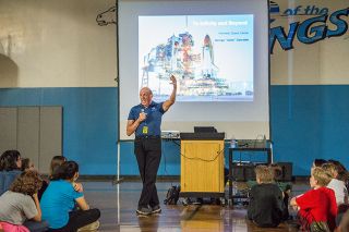 Marcus Larson/News-Register##
NASA educator Gabe Gabrielle gives a presentation to Patton Middle School children. He encouraged middle schoolers to set goals and work hard to meet them.