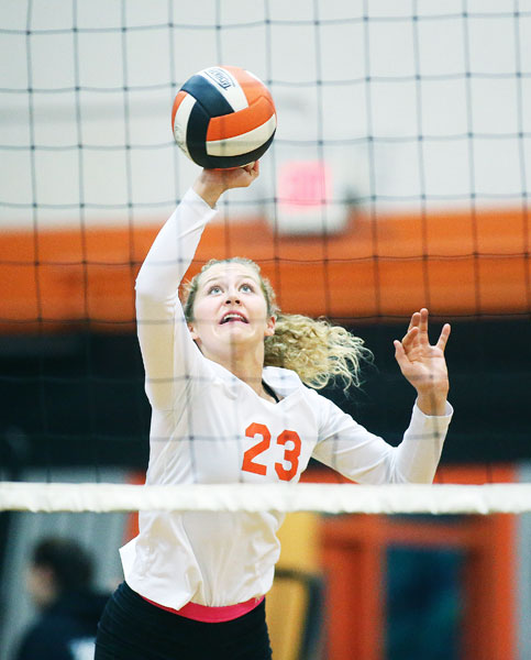 Rockne Roll/News-Register##
Y-C’s Yamhill-Carlton’s Taylor Reimann punches the ball towards the net in the Tigers’ league match against Cascade on Thursday, Sept. 29 at Barnett Court in Yamhill.
