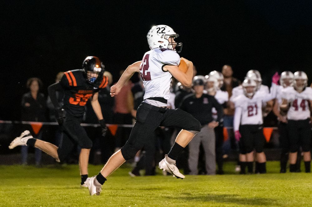 Marcus Larson/News-Register##
Dayton sophomore Justin deSmet races toward the end zone after intercepting a Willamina pass during Friday night s league contest.