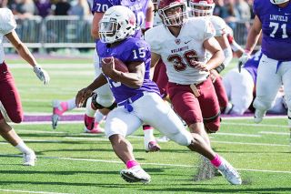 Marcus Larson/News-Register##
Linfield running back Artie Johnson makes a jump-cut against Willamette during last Saturday’s homecoming matchup. Johnson tallied a career-high 120 yards on 11 carries, including three touchdowns. Johnson’s performance helped the Wildcats earn a 59-0 win over their Northwest Conference foes. Marcus Larson/News-Register##
Linfield running back Artie Johnson makes a jump-cut against Willamette during last Saturday’s homecoming matchup. Johnson tallied a career-high 120 yards on 11 carries, including three touchdowns. Johnson’s performance helped the Wildcats earn a 59-0 win over their Northwest Conference foes.