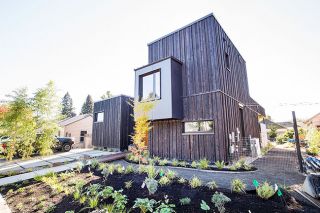 Marcus Larson/News-Register##John Mead and Jenny Berg’s recently finished house features green elements such as solar panels, 10-inch thick walls and a rainwater collection system. Marcus Larson/News-Register##John Mead and Jenny Berg’s recently finished house features green elements such as solar panels, 10-inch thick walls and a rainwater collection system.