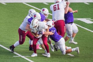 Marcus Larson/News-Register##
Linfield sophomore linebacker Brian Pullman tackles Willamette quarterback Mathew Castaneda for a loss during Saturday’s NWC matchup. Pullman paced the Wildcats with a game-high eight defensive stops, including half a sack. Marcus Larson/News-Register##
Linfield sophomore linebacker Brian Pullman tackles Willamette quarterback Mathew Castaneda for a loss during Saturday’s NWC matchup. Pullman paced the Wildcats with a game-high eight defensive stops, including half a sack.