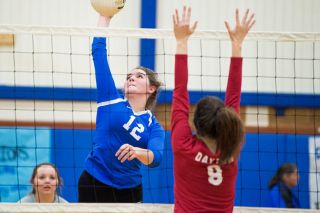 Marcus Larson/News-Register##
Amity outside hitter Sydney Berkey (12) rockets a shot toward Dayton blocker Taylor Wilson during Tuesday’s league match, which the Warriors won in four sets. Marcus Larson/News-Register##
Amity outside hitter Sydney Berkey (12) rockets a shot toward Dayton blocker Taylor Wilson during Tuesday’s league match, which the Warriors won in four sets.