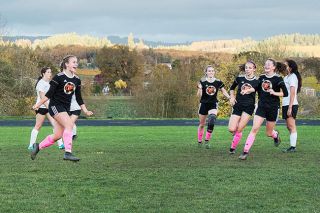 Rusty Rae/News-Register##
Yamhill-Carlton’s Elisabeth Lie (left, in air) celebrates her game-winning goal against Blanchet Catholic. Lie’s strike gave the Tigers a 2-1 lead and eventual 11th straight win. Rusty Rae/News-Register##
Yamhill-Carlton’s Elisabeth Lie (left, in air) celebrates her game-winning goal against Blanchet Catholic. Lie’s strike gave the Tigers a 2-1 lead and eventual 11th straight win.