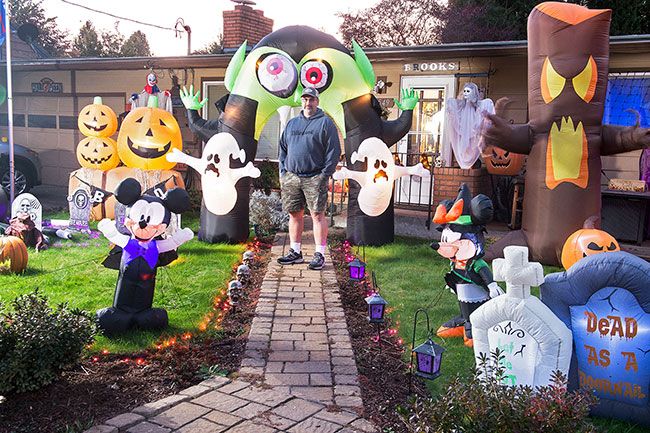 Rusty Rae/News-Register ##
Mike Brooks and his wife Shannon decorate their Morgan Lane home for Halloween each year. They have numerous inflatable items, scary clowns and other fun and frightening displays. They enjoy decorating for Christmas, as well.