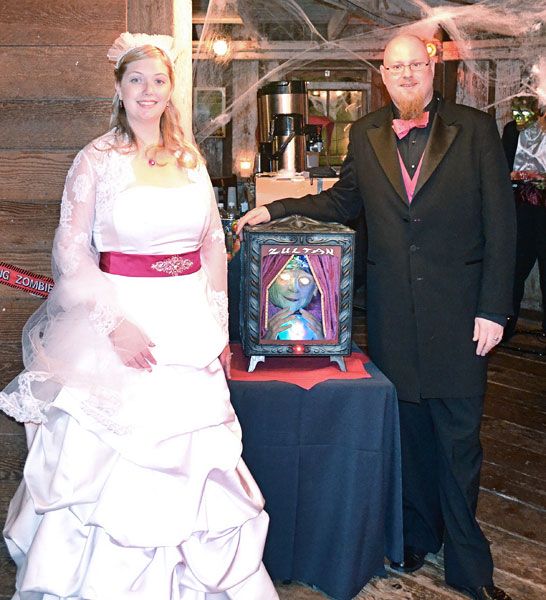 Submitted photo##Dan and Janisse Griffin on their wedding day, Oct. 31. Guests dressed as ghouls and shared a “bloody” cake on their special day.