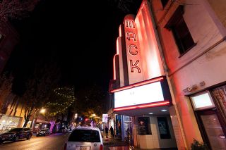News-Register file photo##
Picture taken October 2021 showsf the Mack Theater’s marquee illuminated at night.