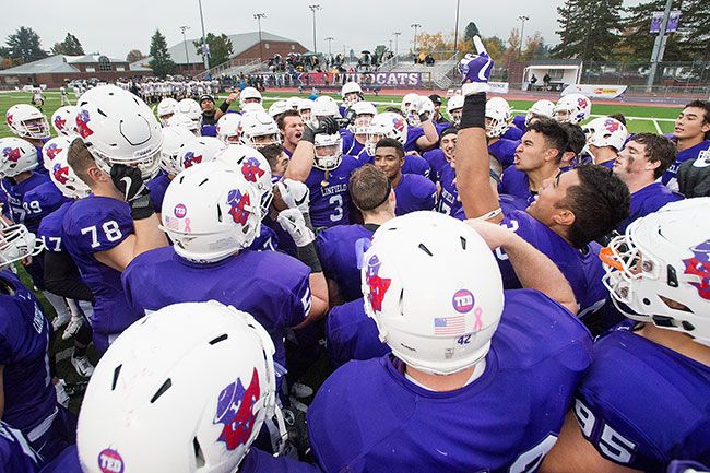 Marcus Larson/News-Register##
Linfield players celebrate their 41-7 victory over PLU, which extended the college s consecutive winning seasons record to 63 years.