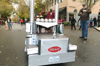 Rusty Rae / News-Register##Travis McKee of Amity celebrates Halloween in downtown McMinnville with his custom-built truck. His dad, Bryce, drives a Peterbilt for a living. But it was his mother, Sydnee, who built Travis s truck. Rusty Rae / News-Register##Travis McKee of Amity celebrates Halloween in downtown McMinnville with his custom-built truck. His dad, Bryce, drives a Peterbilt for a living. But it was his mother, Sydnee, who built Travis s truck.