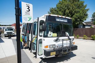 News-Register file photo##Yamhill County Transit Area buses will continue running, although ridership is down. The county is considering a temporary fare decrease.