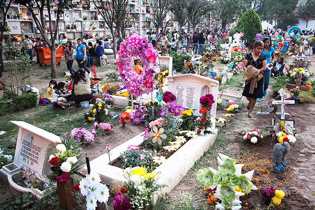 Tomas Castelazo/ Wikimedia 
Commons##Day of the Dead at a Mexican cemetery.