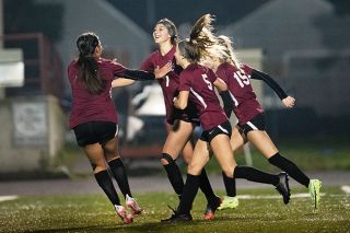Rusty Rae/News-Register##
Joy comes with the go-ahead goal by Melissa Arroyo (7). Coming together after the score are Yulisa Anguiano (at left), Arroyo (7), Renika Oliveira (5) and Kya Kearns (15).