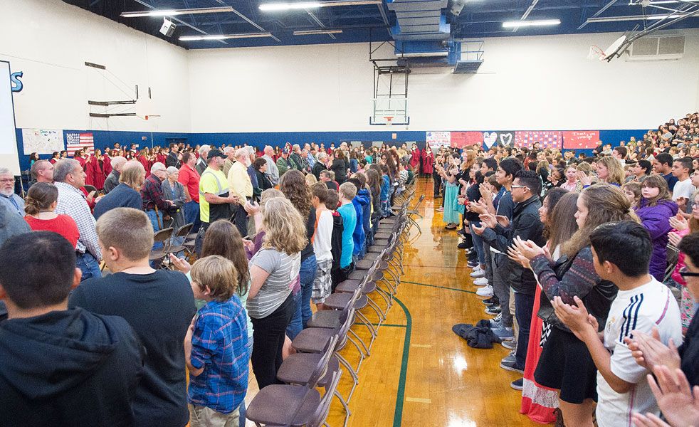 Marcus Larson / News-Register
Patton Middle School students applaud loudly and at length for more than 40 vets and current duty military members who attended their annual Veterans Day assembly Thursday morning.