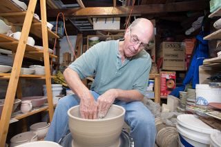 Marcus Larson/News-Register##In his backyard studio, Bill Boyson uses his potter’s wheel to form a large pot. The retired Willamina art teacher has been participating in the Coastal Hills Art Tour for about 20 years. Marcus Larson/News-Register##In his backyard studio, Bill Boyson uses his potter’s wheel to form a large pot. The retired Willamina art teacher has been participating in the Coastal Hills Art Tour for about 20 years.