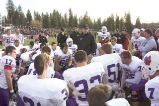Rusty Rae/News-Register##
Grim faces tell the story of a disappointing loss at Whitworth’s Pine Bowl in a 2007 as Linfield head coach Joseph Smith addresses the the team. Combined with a narrow loss to the Pirates in 2006 at the ‘Cat Dome, the ‘07 defeat pushed Smith to focus on the offensive side of the ball and the Wildcats dominated the Northwest Conference for the following decade. Rusty Rae/News-Register##
Grim faces tell the story of a disappointing loss at Whitworth’s Pine Bowl in a 2007 as Linfield head coach Joseph Smith addresses the the team. Combined with a narrow loss to the Pirates in 2006 at the ‘Cat Dome, the ‘07 defeat pushed Smith to focus on the offensive side of the ball and the Wildcats dominated the Northwest Conference for the following decade.