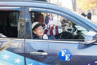Marcus Larson/News-Register##
Veterans and First Responders Parade Grand Marshal Peggy Lutz waves as she cruises down Third Street. Lutz served in the Navy WAVES during World War II and wore her original uniform for the parade. Marcus Larson/News-Register##
Veterans and First Responders Parade Grand Marshal Peggy Lutz waves as she cruises down Third Street. Lutz served in the Navy WAVES during World War II and wore her original uniform for the parade.